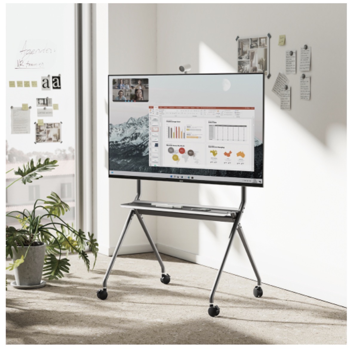 Slim mobile trolley stand with interactive panel in a modern classroom